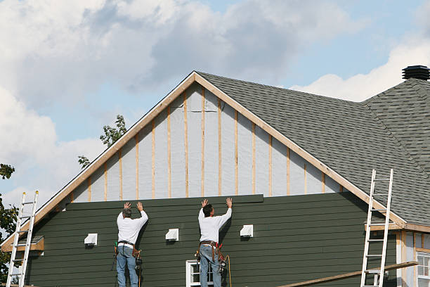 Professional Siding Installation technician working in Fulton, NY